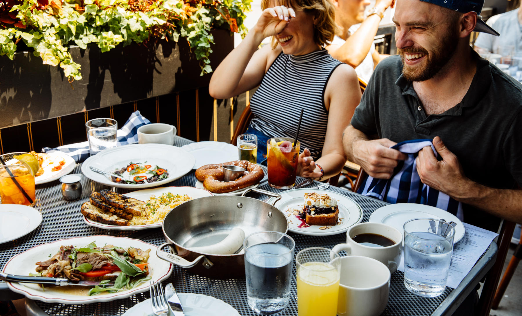 Friends dine on the Publican patio